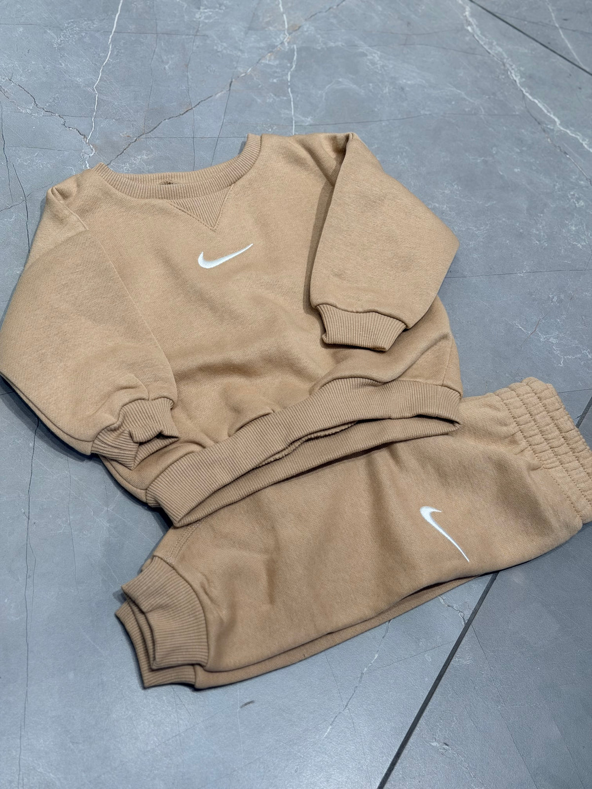 Tuta Nike baby beige
