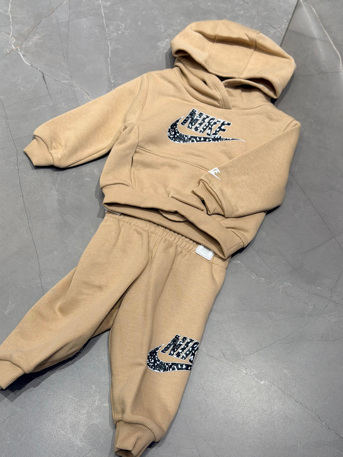 Tuta Nike baby beige